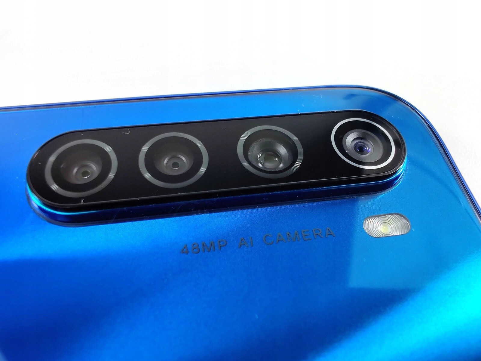 Замена стекла камеры на телефоне Xiaomi Redmi Note 8